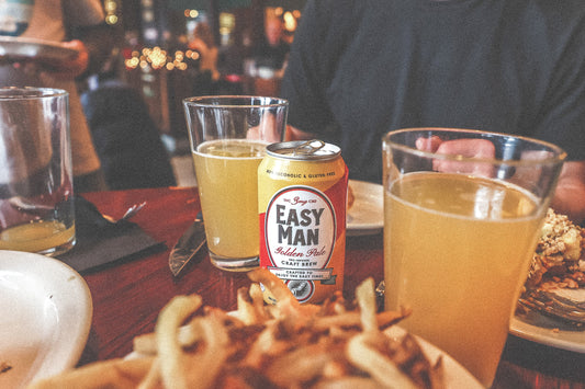 Easy Man, a beer-inspired THC beverage by Go Brewing, poured into a glass—offering a crisp, refreshing alternative to traditional beer.