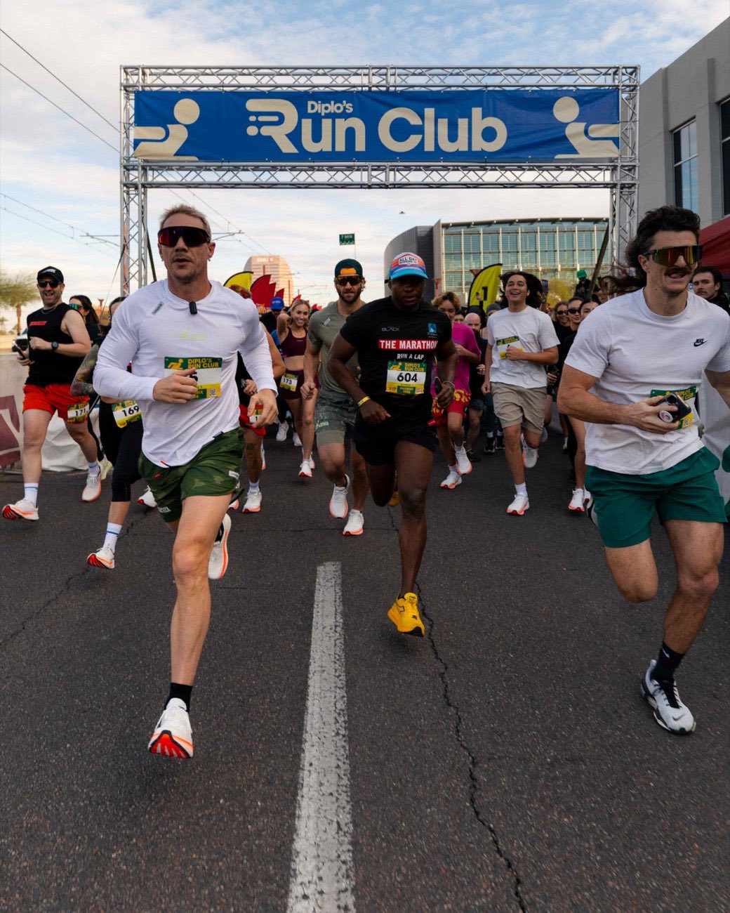 Diplo leading runners off the start line