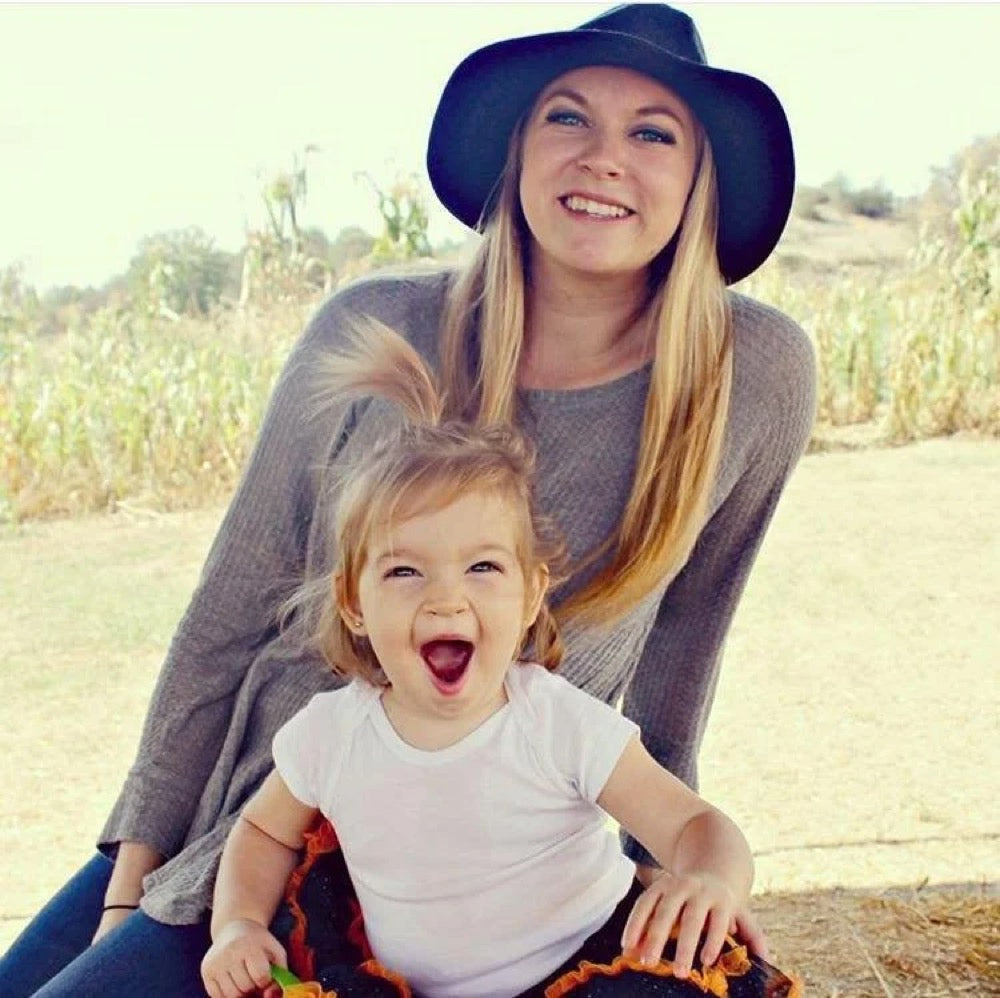 Emma laughing with her mom Jordan
